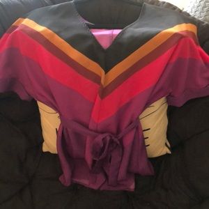 Purple top with orange/brown, black, & hot pink